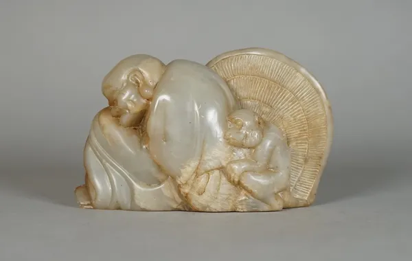 A Chinese soapstone group, probably 19th century, carved as a seated luohan, asleep with a monkey and parasol behind, 6cm. high.