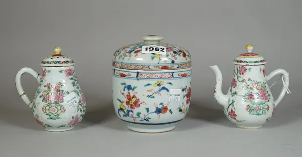 A Chinese famille-rose cylindrical jar and cover, Qianlong, painted with flowers beneath a diaper pattern border, (a.f), 13cm. high; also a famille-ro