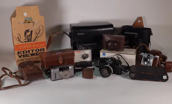 A large quantity of 20th century photography equipment to include cameras, Canon, Kodak and sundry, (qty).