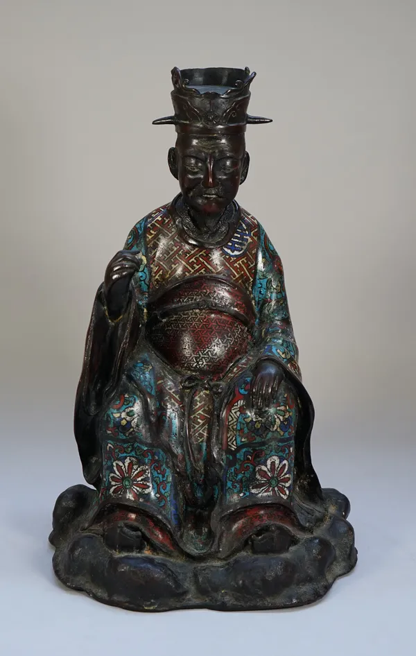 A large bronze and champleve enamel figure of a scholar, 19th century, seated looking downwards in  a meditative pose  with right hand raised, 43cm. h