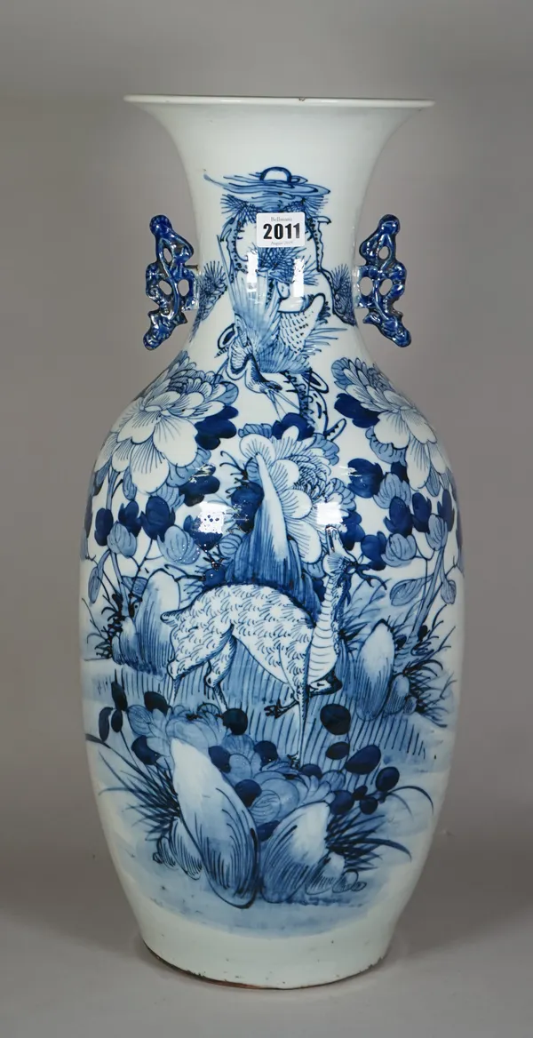 A tall Chinese blue and white two-handled baluster vase, early 20th century, painted with a deer in a landscape looking up at a bird flying above, 58c