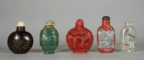 A group of five Chinese snuff bottles, 20th century, comprising; two inside painted bottles, a red lacquer bottle decorated with figures; a green over