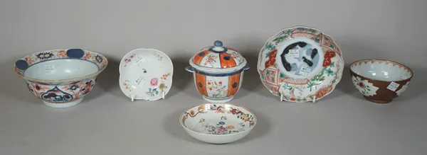 A group of Chinese porcelains, Qianlong, comprising' a famille-rose `Japan' pattern two-handled fluted bowl and cover, painted with panels of flowers