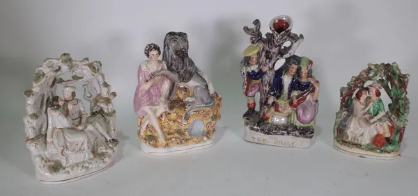 A Victorian Staffordshire figure of Androcles and The Lion, 28cm high, together with three other later Staffordshire figures, (4) (a.f.).