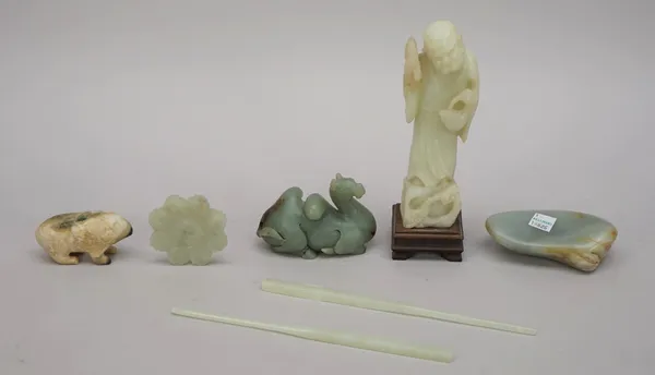 A group of Chinese jade and hardstone carvings, comprising; a pair of pale celadon jade chopsticks; a green and brown jade recumbent camel, 10cm. leng