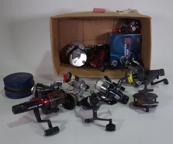 A box of mixed fishing reels, sea multipliers, fly reels one in hardy reel pouch, a trotting reel and a quantity of freshwater spinning reels, (qty).