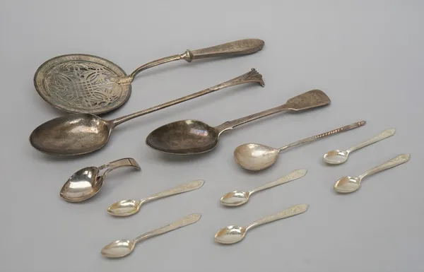 Silver, comprising; an Onslow pattern bottom marked stuffing spoon, London possibly 1768, a fiddle pattern tablespoon, London 1836 and a tea caddy spo