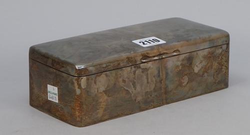 A late Victorian silver table cigarette box, the exterior plain, wooden lined within, length 21cm, Birmingham 1899. Illustrated.