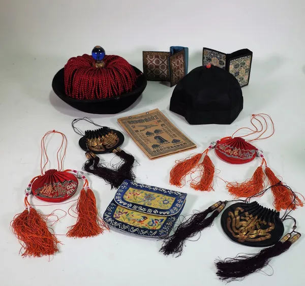 Asian collectables including a Chinese silk and velvet Official's hat with blue glass finial, a folding black hat and a group of embroidered panels, a