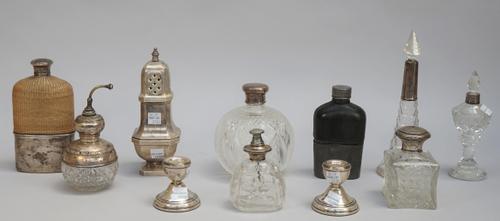 Silver and silver mounted wares, comprising; a rushwork bound glass spirit flask, with a pull-off beaker base, London 1869, six various faceted glass