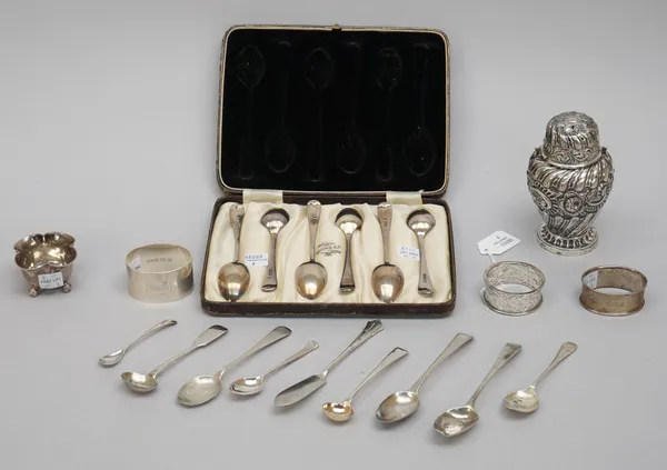 Silver, comprising; a set of six Old English pattern teaspoons, Sheffield 1923, with a case, a sugar caster, three napkin rings, a butter knife, a sal