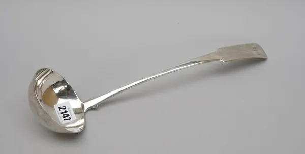 A Scottish silver fiddle pattern soup ladle, engraved with the initial W (the hallmark date indistinct) circa 1820, weight 189 gms.