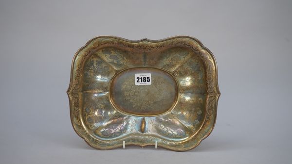 A Russian shaped rectangular dish, with foliate engraved decoration within a border of foliate scrolls, the oval centre with floral engraved decoratio