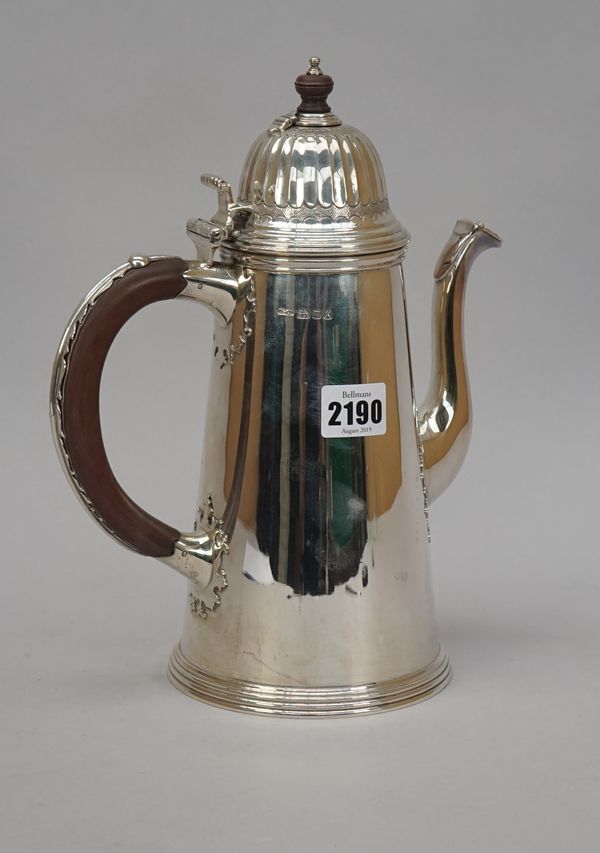 A Tiffany & Co silver coffee pot, of tapered cylindrical form, with a silver mounted wooden handle, the hinged cover with partly fluted decoration and