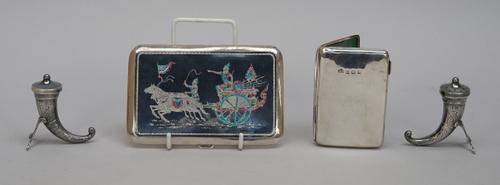 A pair of Norwegian Sterling condiments, comprising; a salt and a pepper, each of horn shaped form, with an integral stand, raised on paw feet, maker