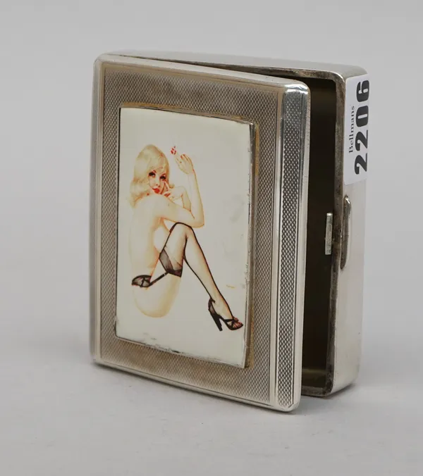 A silver hinge lidded rectangular cigarette box, the lid later applied with an enamelled panel, depicting a semi clad seated figure of a lady with blo