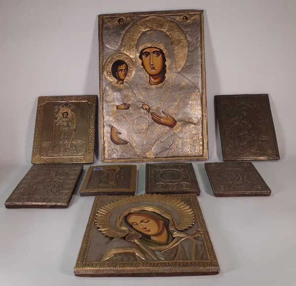 A group of eight 20th century Russian Icons, the largest 38cm wide x 53cm high, (8).