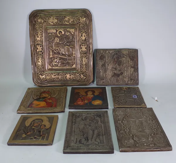 A group of eight 20th century Russian Icons, the largest 40cm wide x 50cm high, (8).