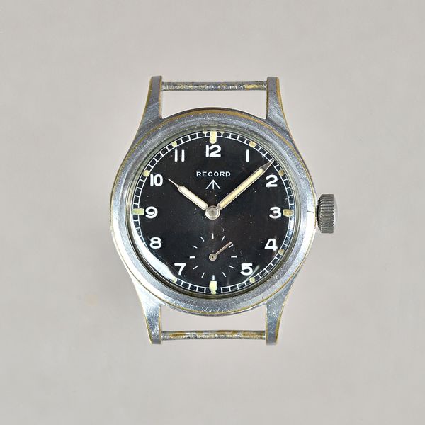 A Record M.O.D issue base metal cased and steel backed gentleman's wristwatch, the signed black dial with white Arabic numerals and with subsidiary se