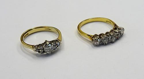 An 18ct gold and diamond set five stone ring, mounted with a row of cushion shaped diamonds, London 1978, ring size K and a 9ct gold and diamond ring,