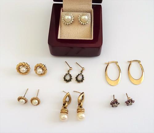 A pair of 18ct white gold, cultured pearl and diamond set circular cluster earstuds, with post and butterfly clip fittings, with a case, a pair of opa