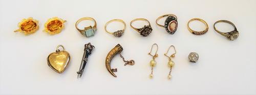 A pair of gold mounted, yellow gem set earrings, a 9ct gold, ruby and diamond half hoop ring, two 9ct gold, diamond and gem set rings, a 9ct gold, rub