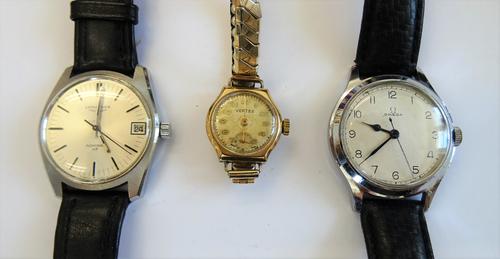 A Longines Admiral H F steel cased gentleman's wristwatch, the signed silvered dial with black baton numerals, centre seconds and with a date of the m