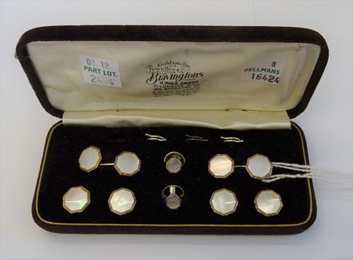 A silver, gold and mother-of-pearl evening wear dress set, comprising; a pair of cufflinks, a pair of studs and four buttons, each of octagonal form,