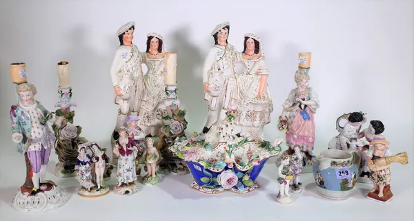 Ceramics, a pair of large Staffordshire figures, two pairs of Meissen style candlesticks and a quantity of Continental porcelain figures, (qty.).