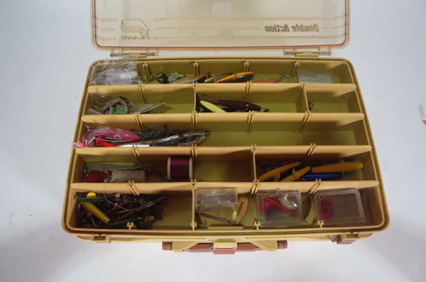 A large lure box with a quantity of fishing lures, including four Hardy lures, six Bruce & Walker lures, Lemax, Wadhams and sundry, (qty).