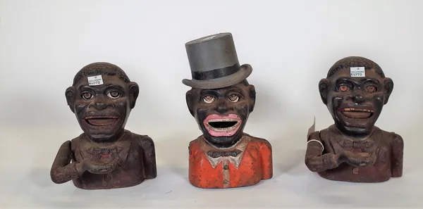 A group of three early 20th century 'Jolly' cast iron money boxes, the tallest 19cm high, (3).