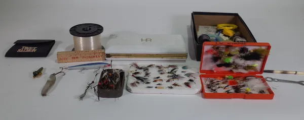 A large red plastic box containing mainly vintage fishing lures, to include; Hardy and other makers and some salmon flies, (qty).