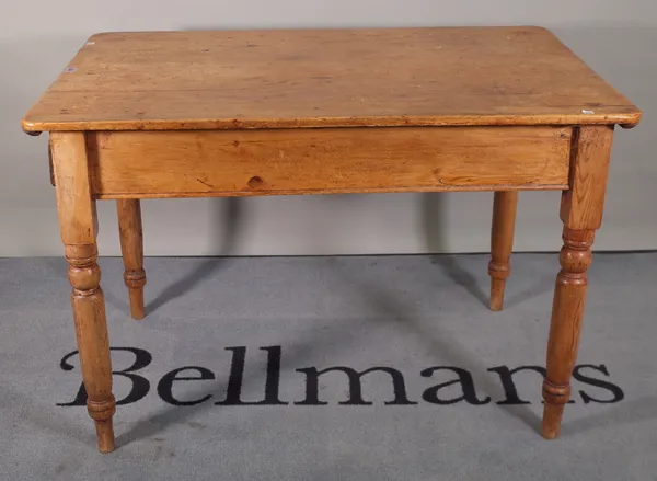 An early 20th century pine dining table with single drawer on tapering supports, 107cm wide x 72cm high.