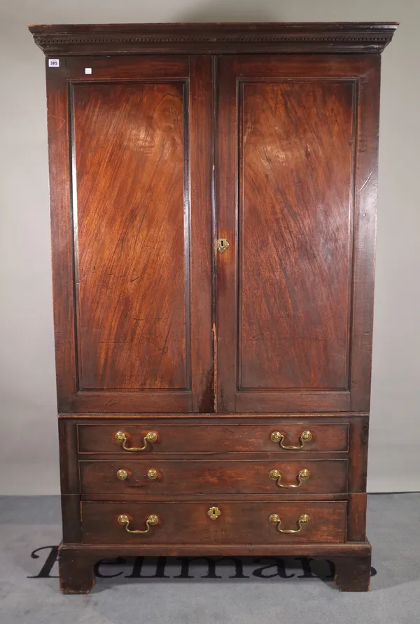 A George III mahogany linen press with two dummy drawers over single drawer on bracket feet, 10cm wide x 83cm high.