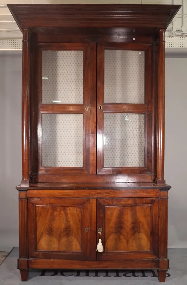 A 19th century Continental walnut bookcase, with fluted moulded edges, 134cm wide x 243cm high.