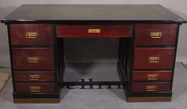 A 20th century black painted oak kneehole desk, with green leather top, 149cm wide x 77cm high.