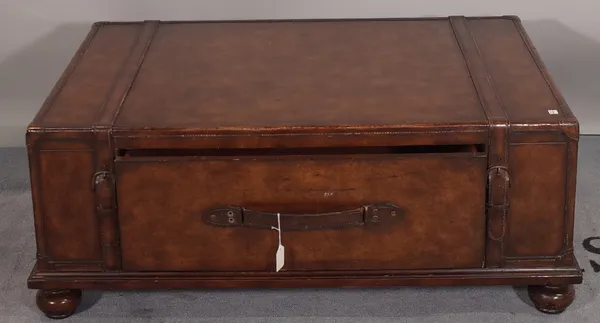 A 20th century faux leather bound single drawer coffee table on bun feet, 102cm wide x 40cm high.