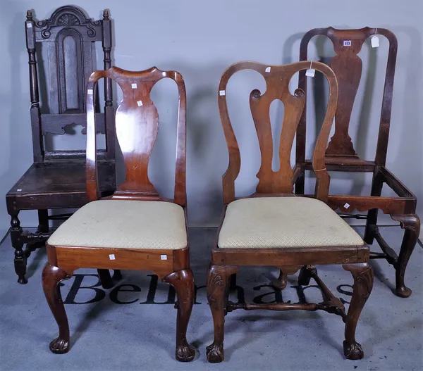 A group of three Queen Anne style mahogany vase back dining chairs and a late 18th century oak highback dining chair, (4).