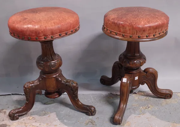 Two similar Victorian mahogany adjustable piano stools, each 32cm wide x 46cm high.