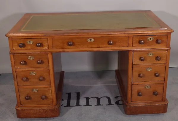 A late 19th century mahogany pedestal desk with green leather inset top, 120cm wide x 73cm high.