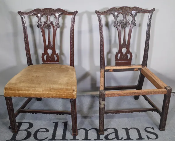 A pair of George III mahogany side chairs with gadrooned carved frame and pierced splat on carved canted square supports united by shaped stretcher, 5