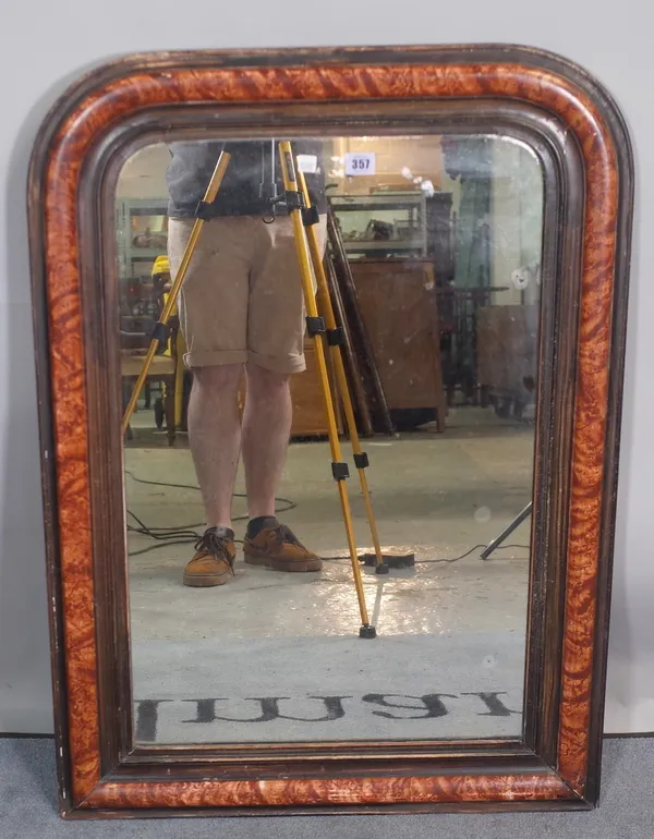 A 19th century French arch top mirror with simulated tortoiseshell frame, 65cm wide x 91cm high.