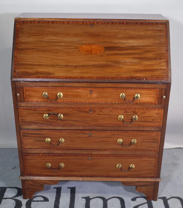 An Edwardian mahogany inlaid bureau with fitted interior over four long graduated drawers, on bracket feet  76cm wide x 96cm high.