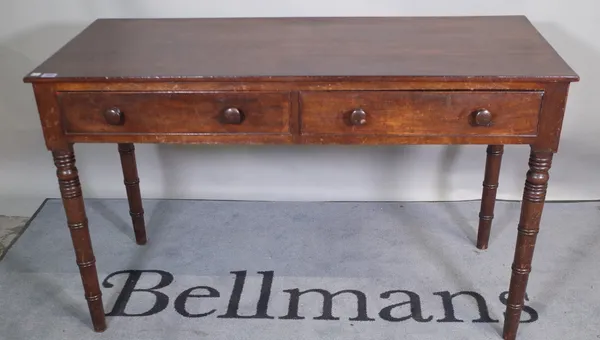 A 19th century mahogany two drawer side table on ring turned tapering supports, 120cm wide x 73cm high.