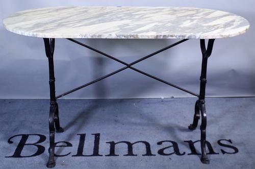 A 19th century and later marble top oval centre table, on cast iron base, 120cm wide x 74cm high.