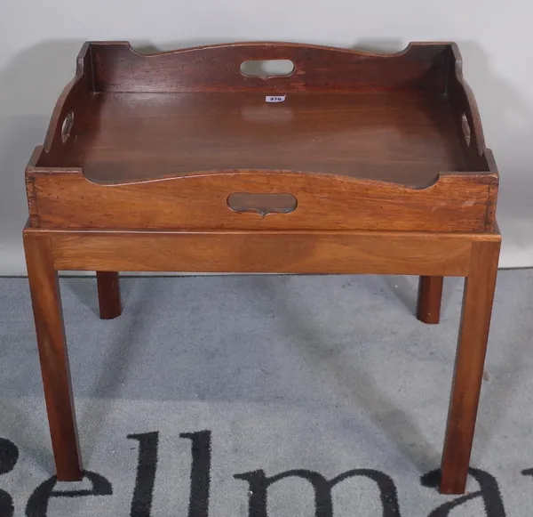 A George III style mahogany butlers tray on stand, 62cm wide x 55cm high, and a 20th century oak lift top box, 47cm wide x 46cm high, (2).