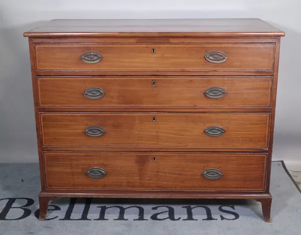 A George III mahogany and feather banded chest of four long graduated drawers on splayed bracket feet, 114cm wide x 93cm high.