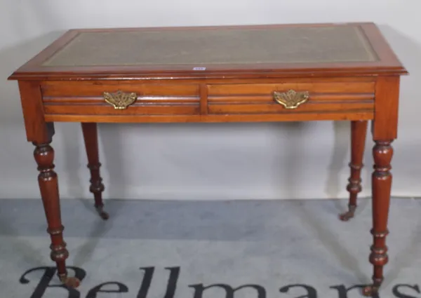 A Victorian mahogany two drawer side table with green leather inset top, 106cm wide x 75cm high.