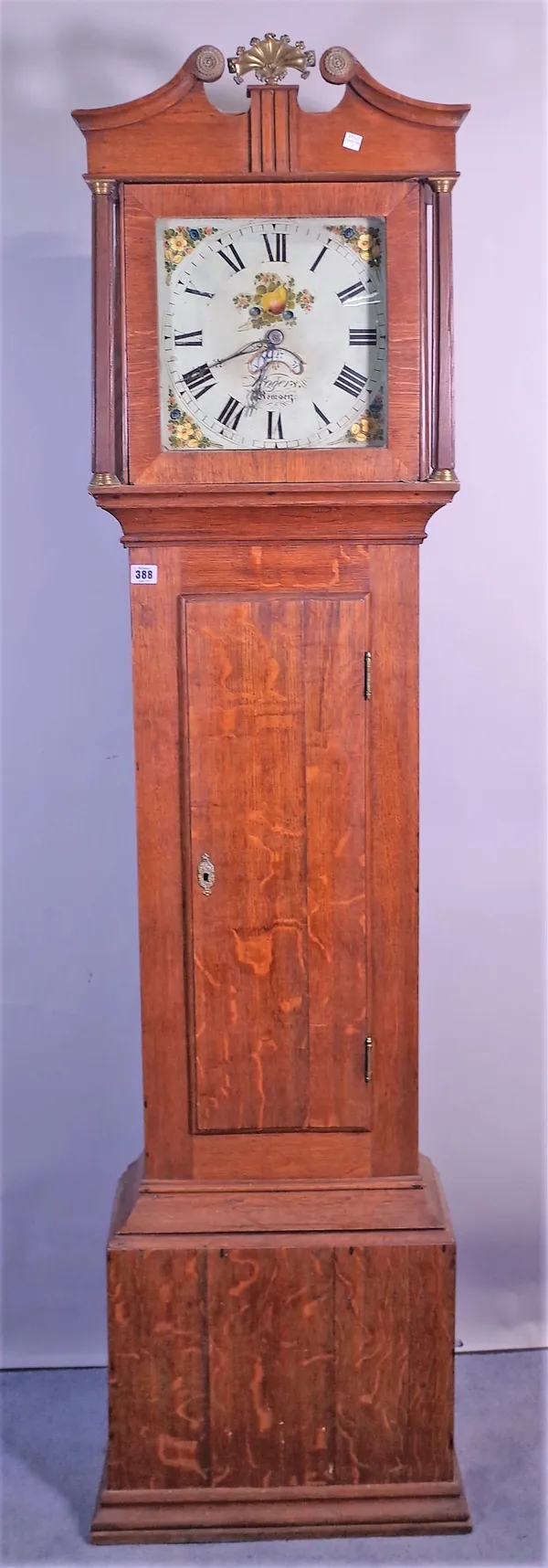 Rogers Romsey; a 19th century oak cased 30 hour longcase clock, 140cm high.