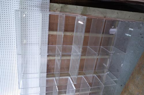 A pair of 20th century perspex three tier open bookcases, 101cm wide x 81cm high, (2).  Provenance; property from the late Sir David TangThis lot has